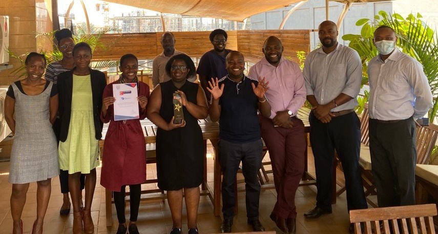 Bboxx Kenya team posses with their award plaque